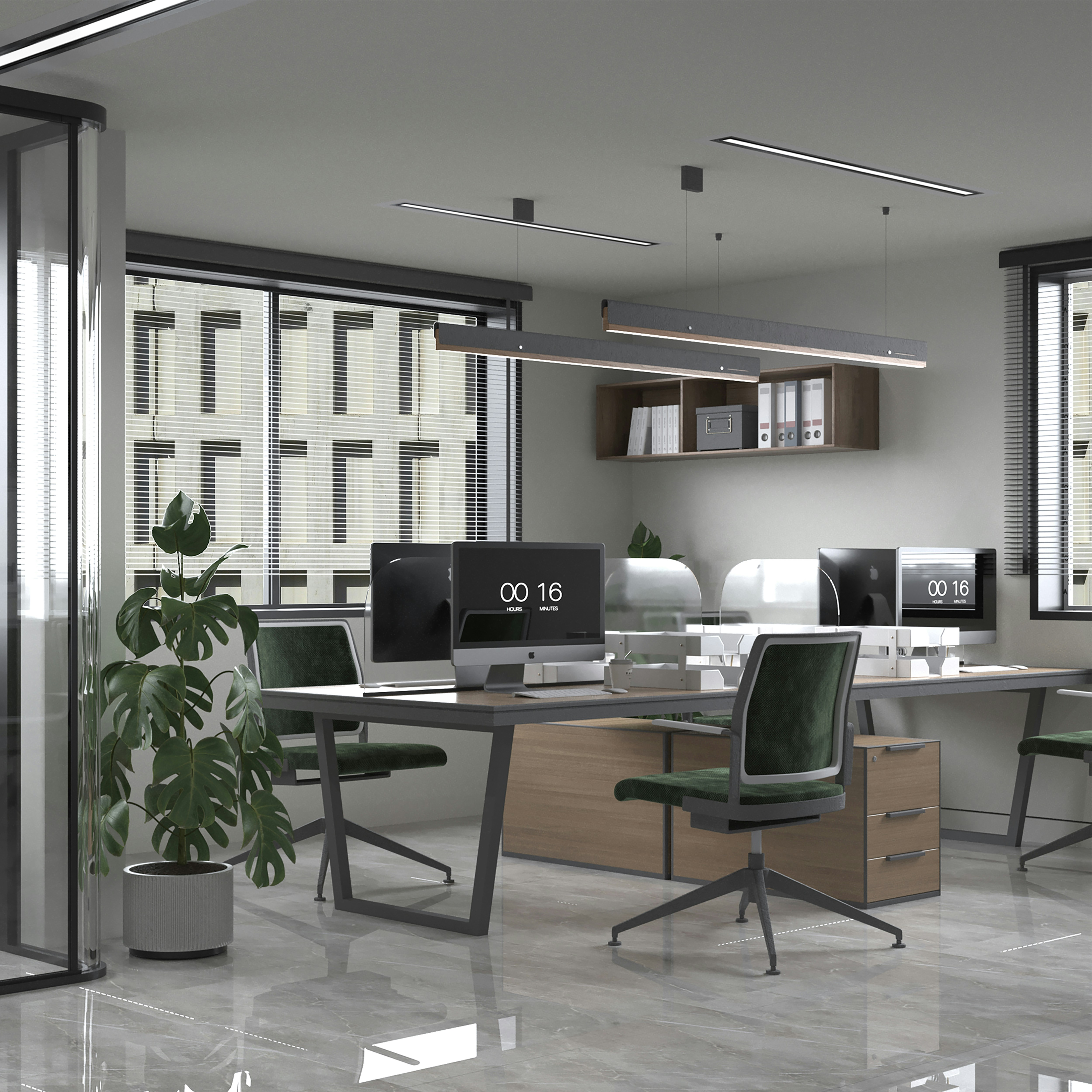 Modern professional office interior with desks, computers, and plants behind glass partition walls